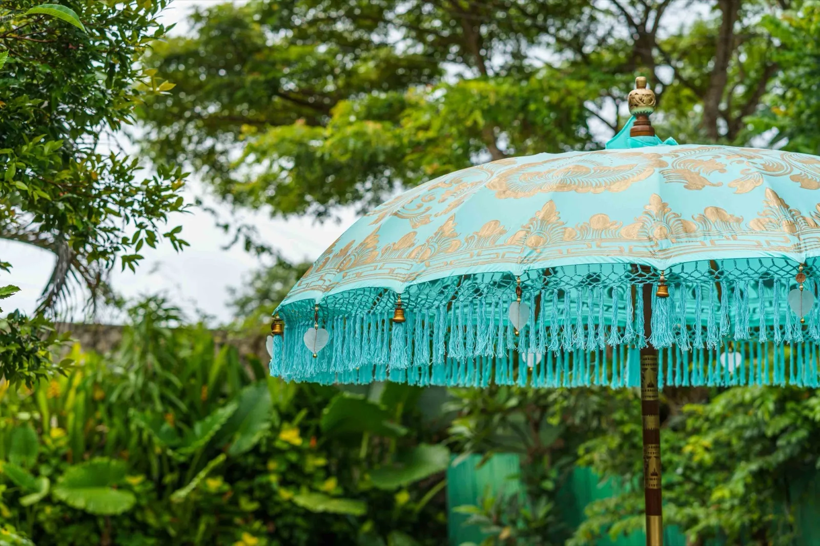 Aquamarine Bali umbrella · Turquoise · hand-worked deep-teal scrollwork