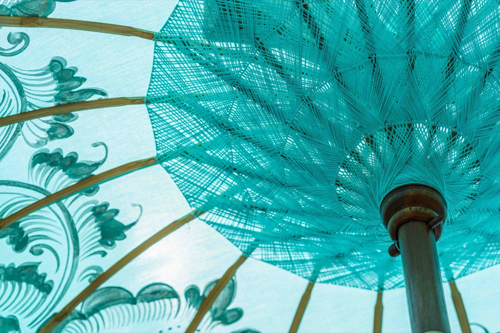 Aquamarine Bali umbrella · Turquoise · hand-worked deep-teal scrollwork